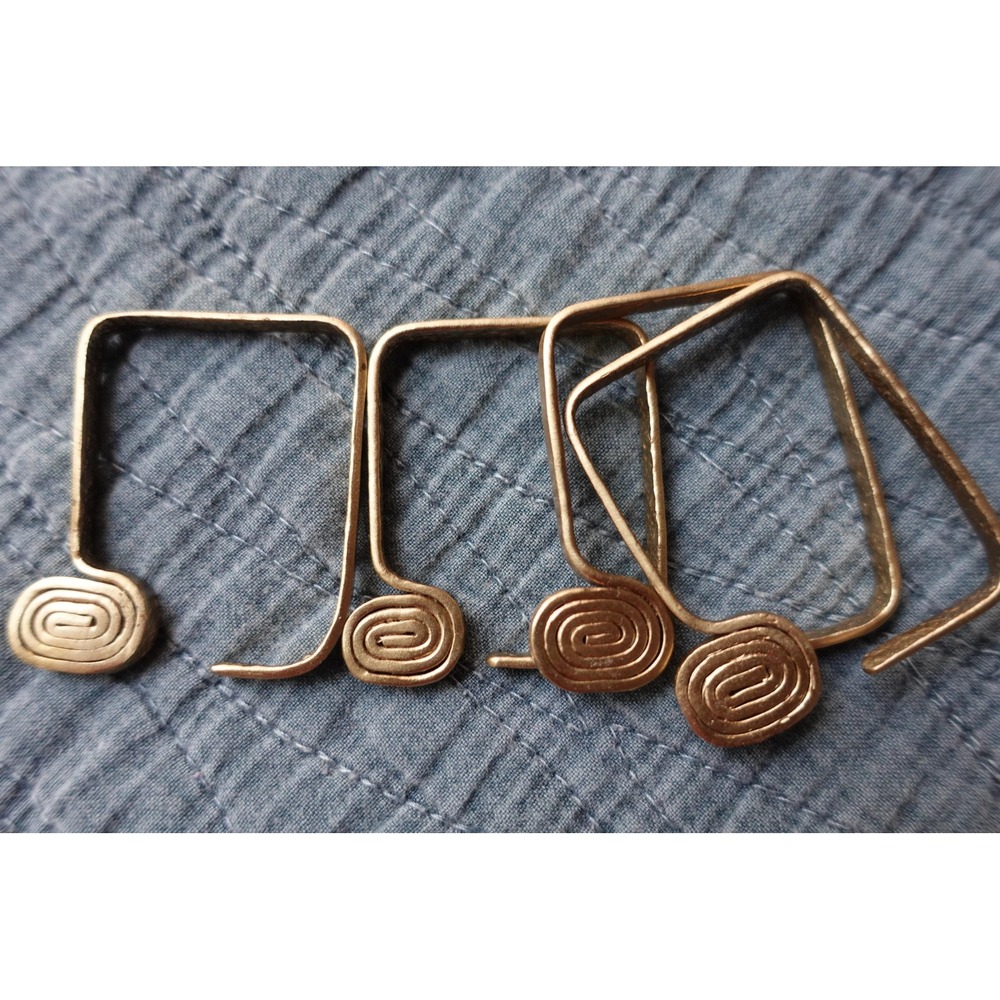 set‎ of 4 Vintage napkin rings metal brass with swirl rectangular design
